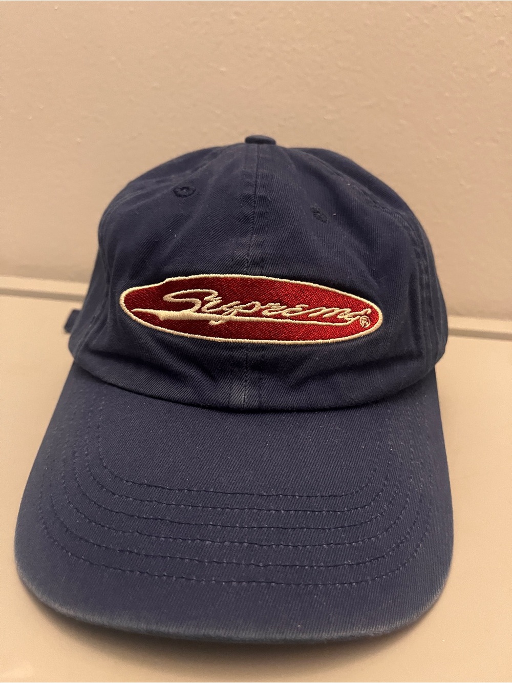 Supreme Oval 6-Panel cap in Light Navy from the Spring/Summer 2023 collection.